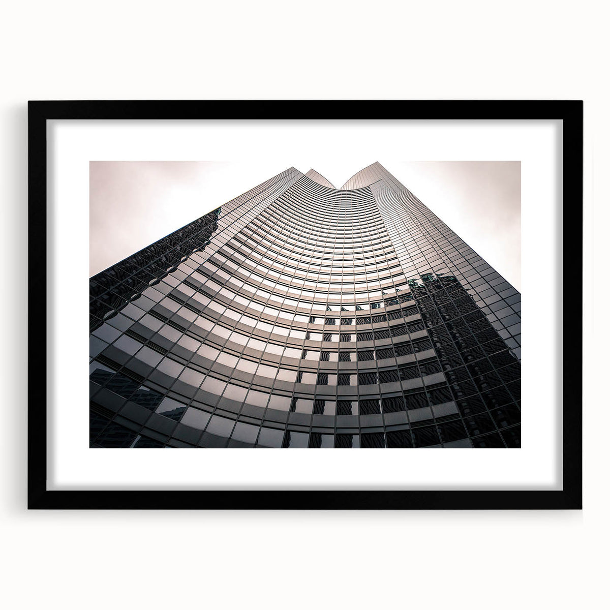 Extra large abstract art print of colorful, textured London scenery on a black-framed canvas, ideal for living room decor.