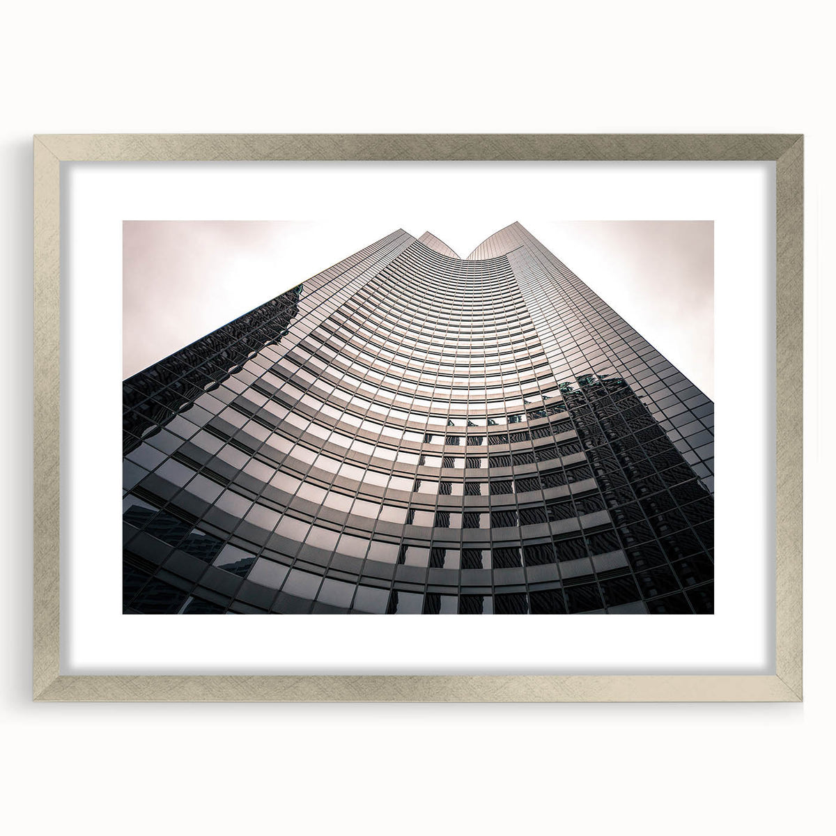 Extra large abstract art print of the London skyline in muted gray and silver tones on a textured canvas.