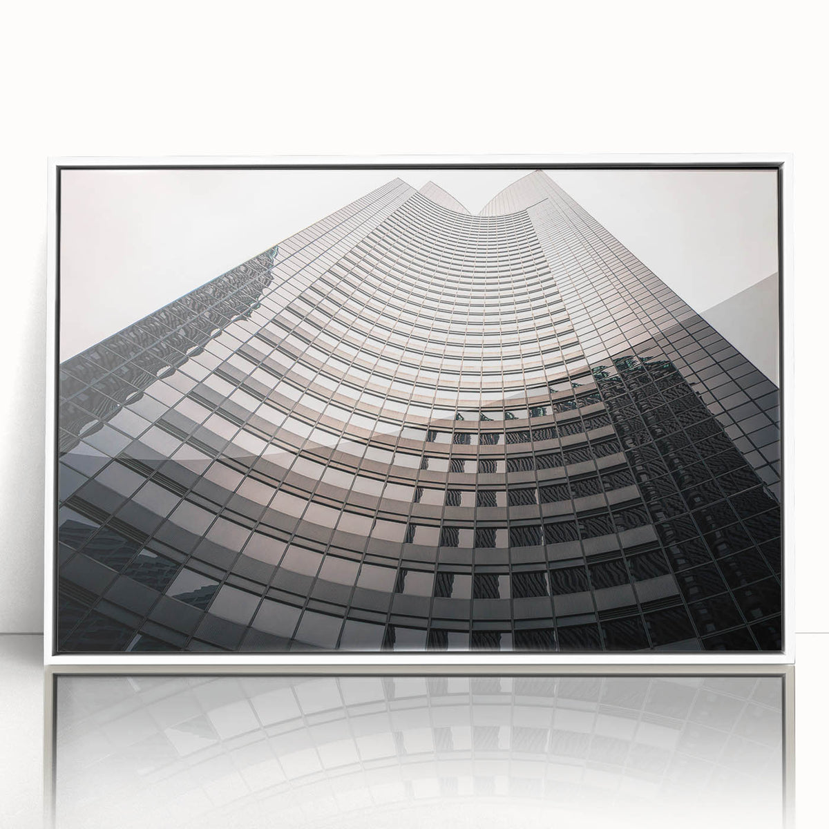 Mid-century modernist art depicting London scenery in muted grays and blues on a white framed acrylic.
