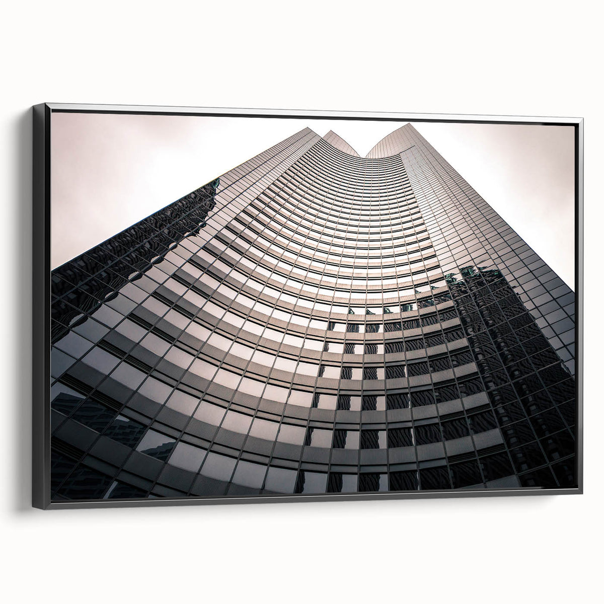 Black and white wall art featuring a vintage poster-style landscape of London on framed canvas, suitable for bedroom decor.