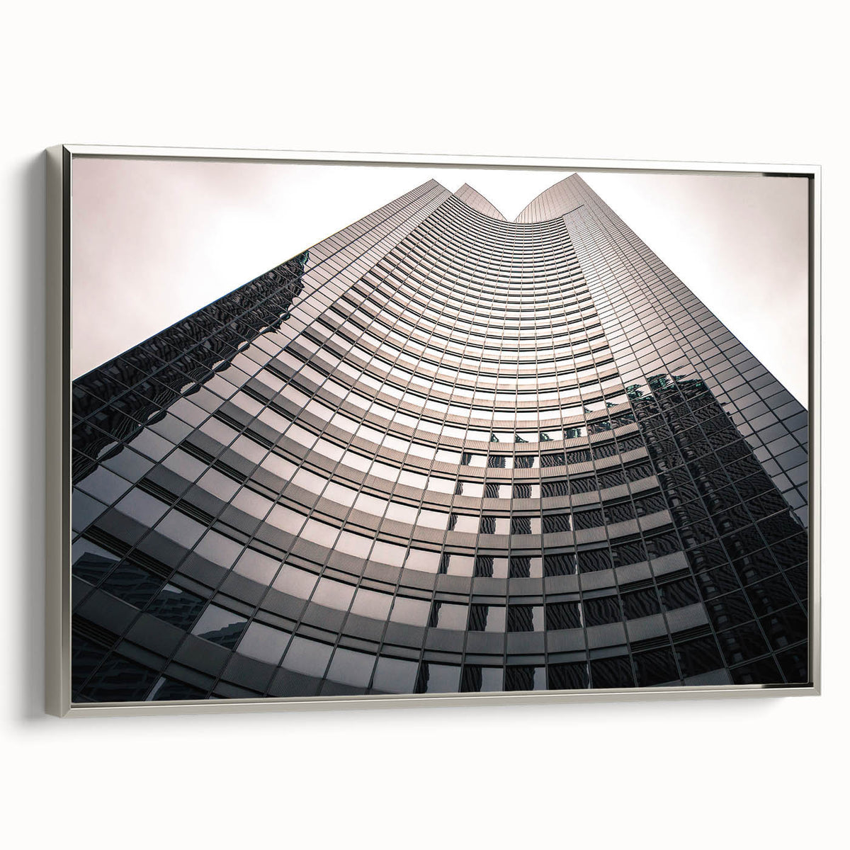 Landscape art painting of London featuring colorful art on black background in a silver-framed canvas.