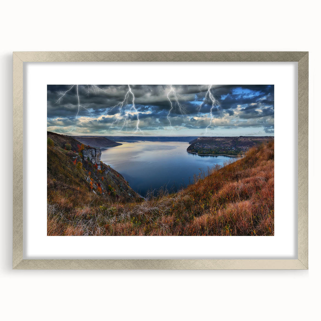 Textured abstract art print of a European scenery in muted earth tones, framed in silver, ideal for bedroom decor.