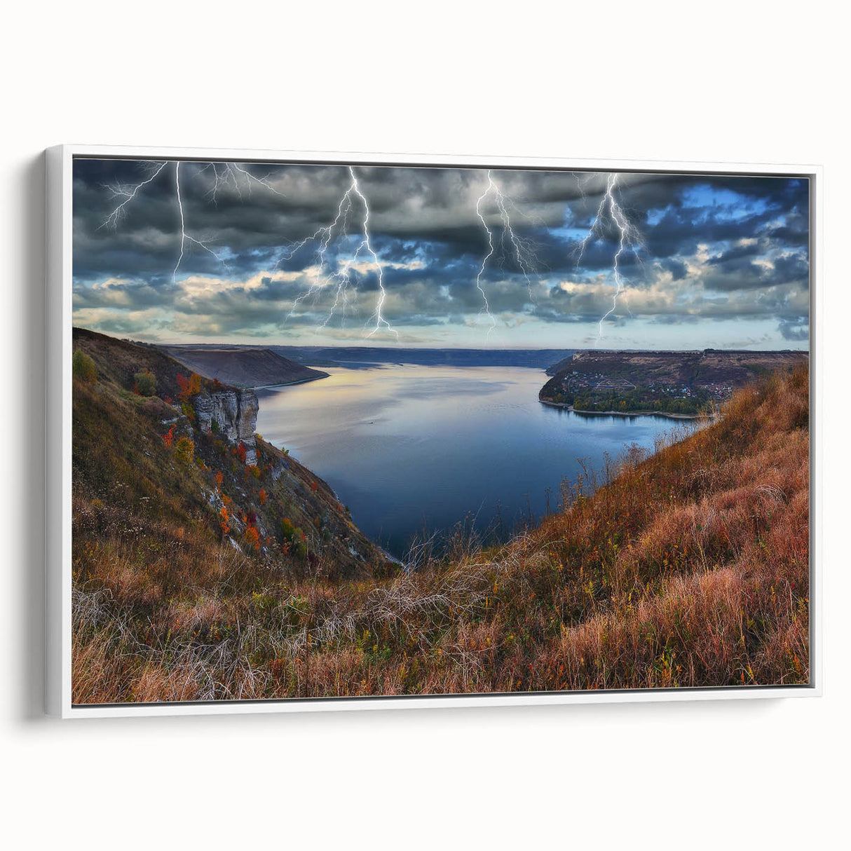 Vintage poster art of a scenic European landscape, featuring colorful art on a large framed canvas.