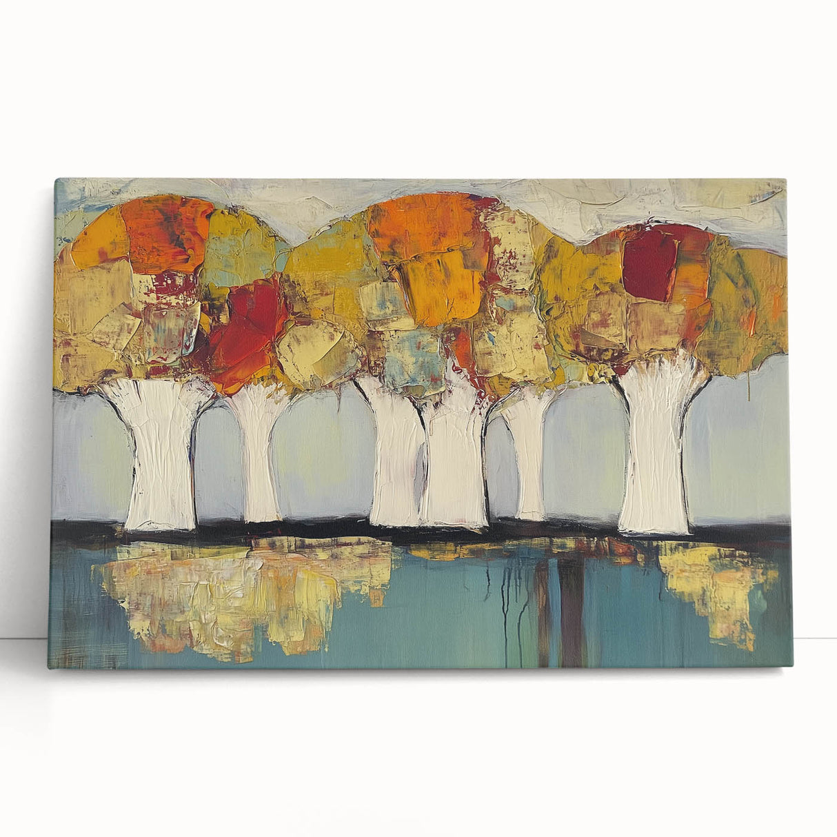 Abstract floral canvas art featuring vibrant colors and intricate designs, elegantly leaning against a neutral wall, perfect for modern home decor.