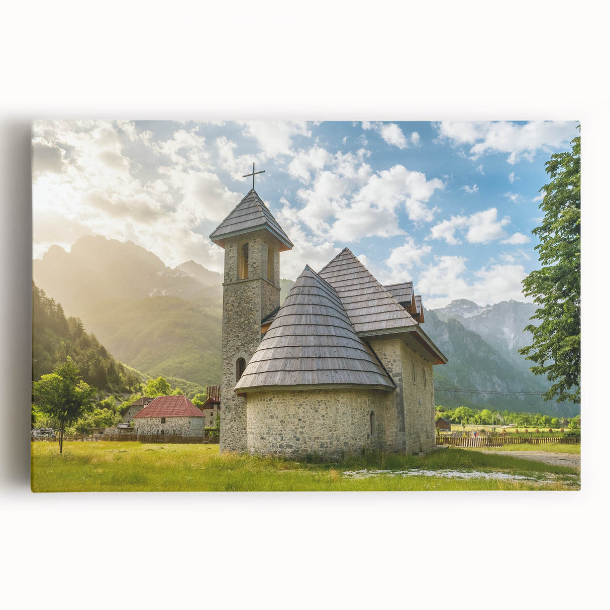 Black and white photograph of a European landscape on large stretched canvas.