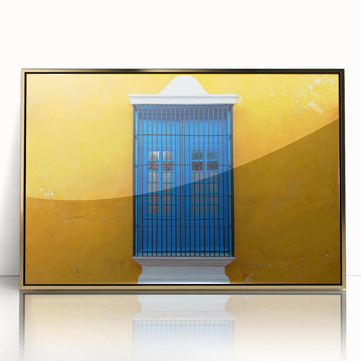 Large acrylic print of a Yucatan scenery in gold frame, featuring mid-century modernist style.