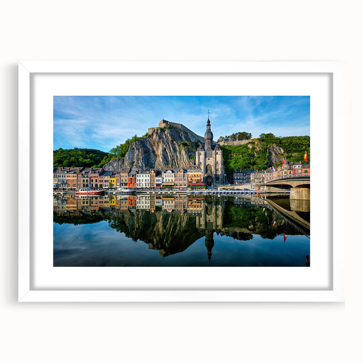 Textured abstract art print depicting a European scenery, in muted earth tones, framed with a white mat.