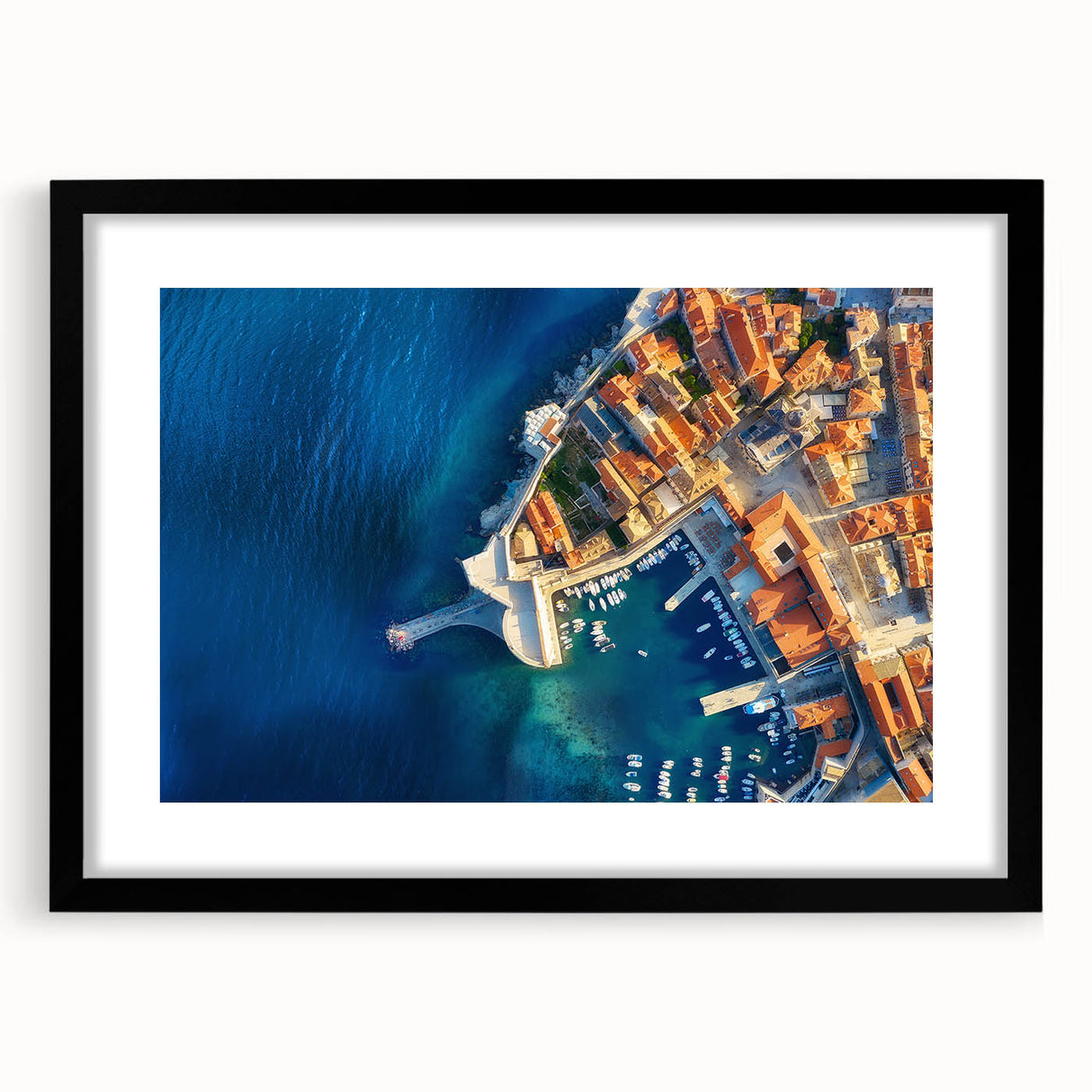 Colorful abstract art print of a Croatian landscape in vibrant hues on a large framed canvas, ideal for living room decor.