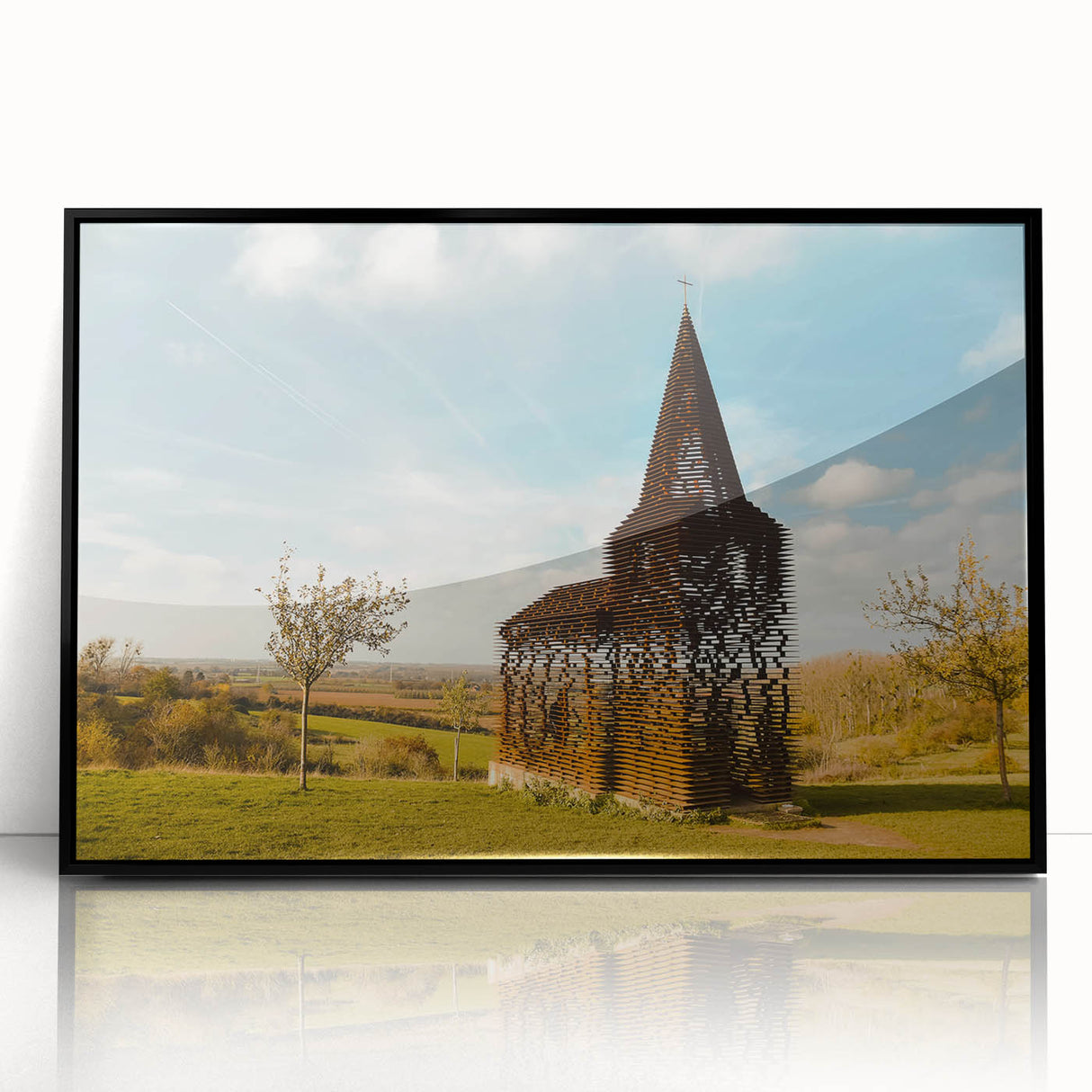 Large abstract wall art depicting a European cityscape in muted gray and blue tones, framed in black acrylic.