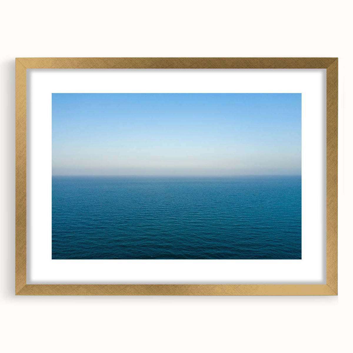 Abstract art print of a Southern France landscape in muted earth tones on a framed gold canvas.