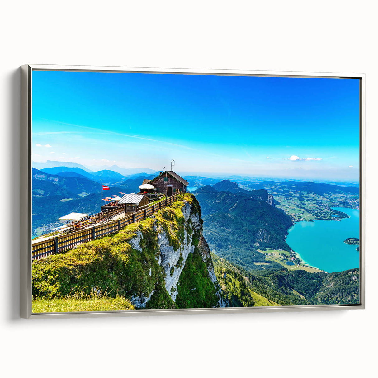Framed canvas of a colorful Austrian landscape, featuring vibrant green and blue tones, ideal for living room decor.
