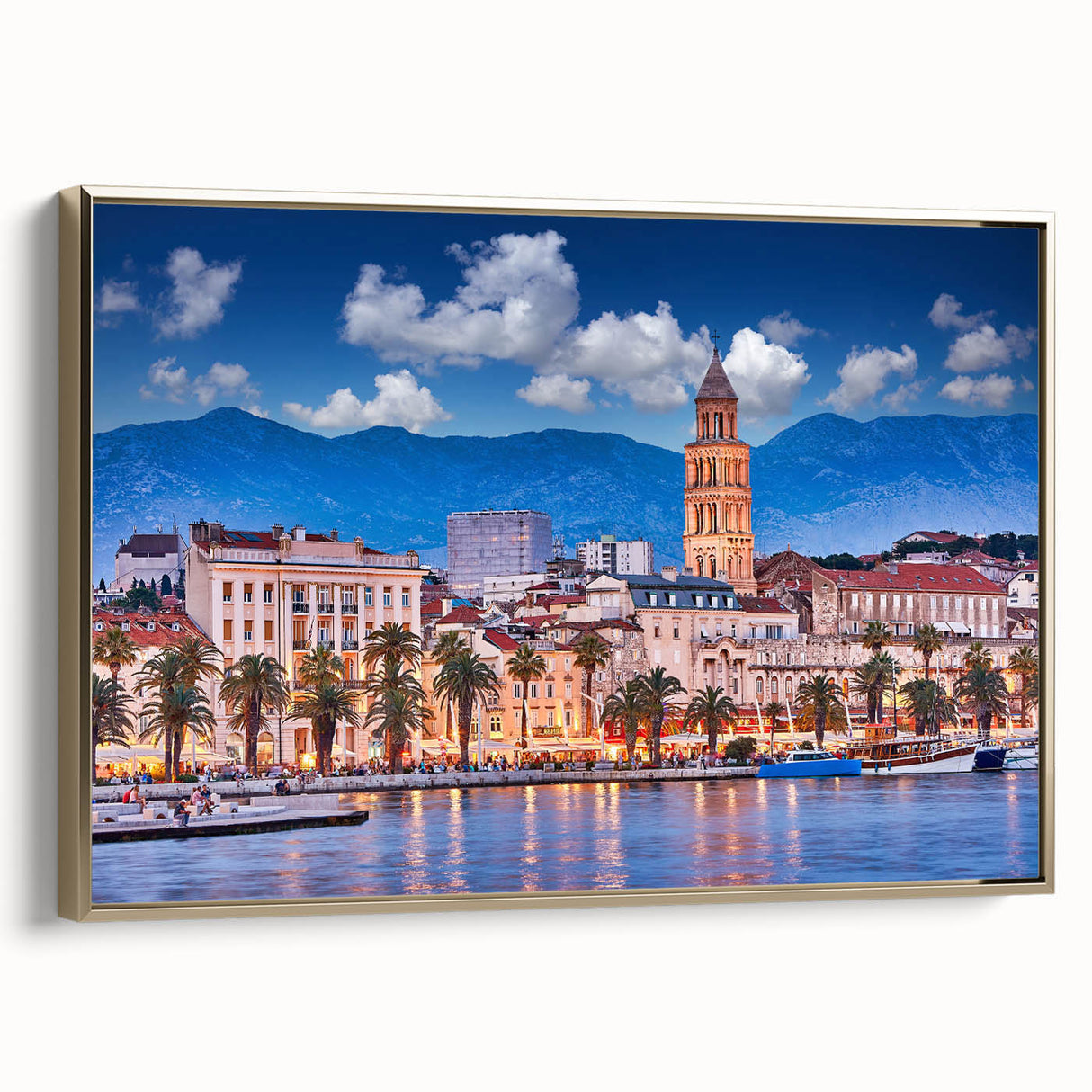 Framed canvas wall art showing a vintage-style landscape of a Croatian scene with muted gold and black tones.