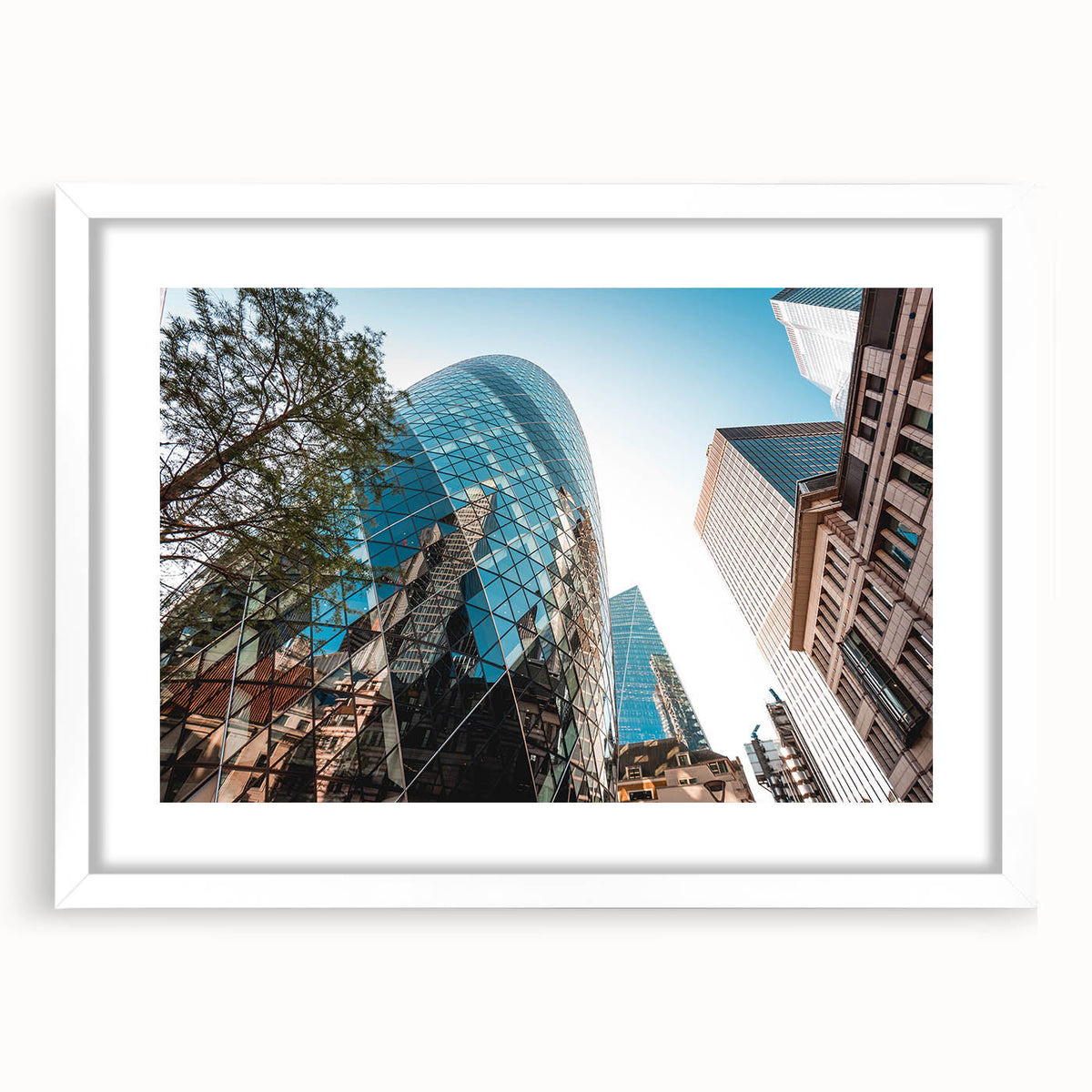 Textured art print of an abstract London skyline in gray and blue tones, framed with a white mat, ideal for bedroom decor.