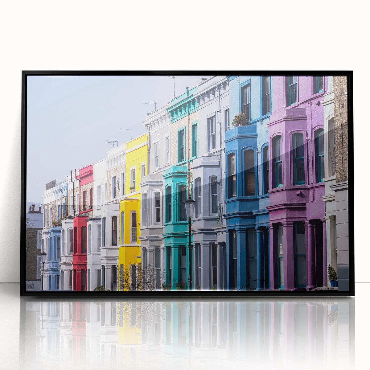 Large abstract wall art of London scenery in muted gray and blue tones, framed in black acrylic.