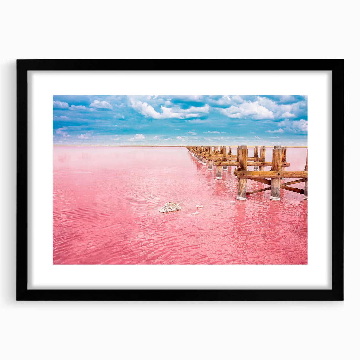 Extra large abstract art print of a colorful Yucatan scenery on textured canvas, framed in black.