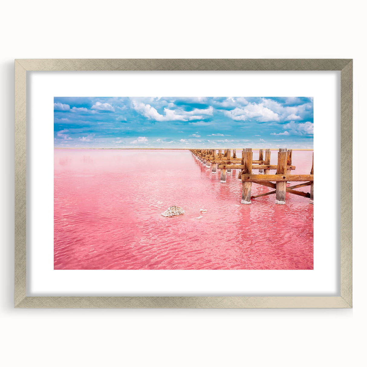 Textured abstract art print of Yucatan scenery in silver frame, ideal for bedroom ambiance.