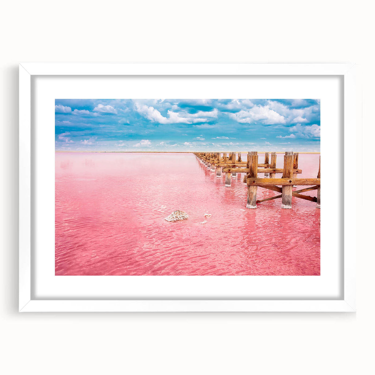 Abstract art print of Yucatan scenery in muted earth tones on a framed white mat, suitable for bedroom or dining room decor.