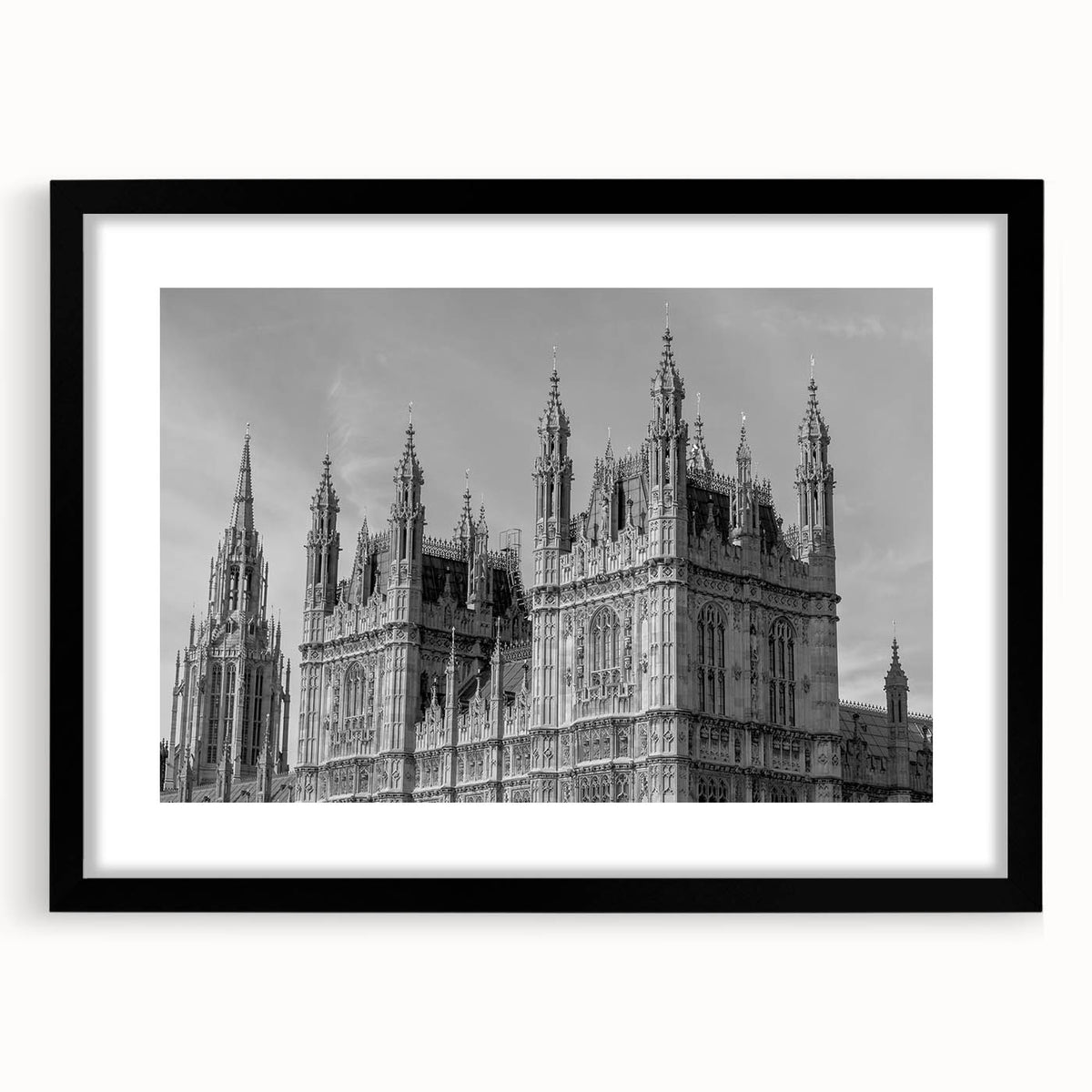 Abstract art print of London scenery in vibrant colors on a textured, extra large canvas, framed in black.