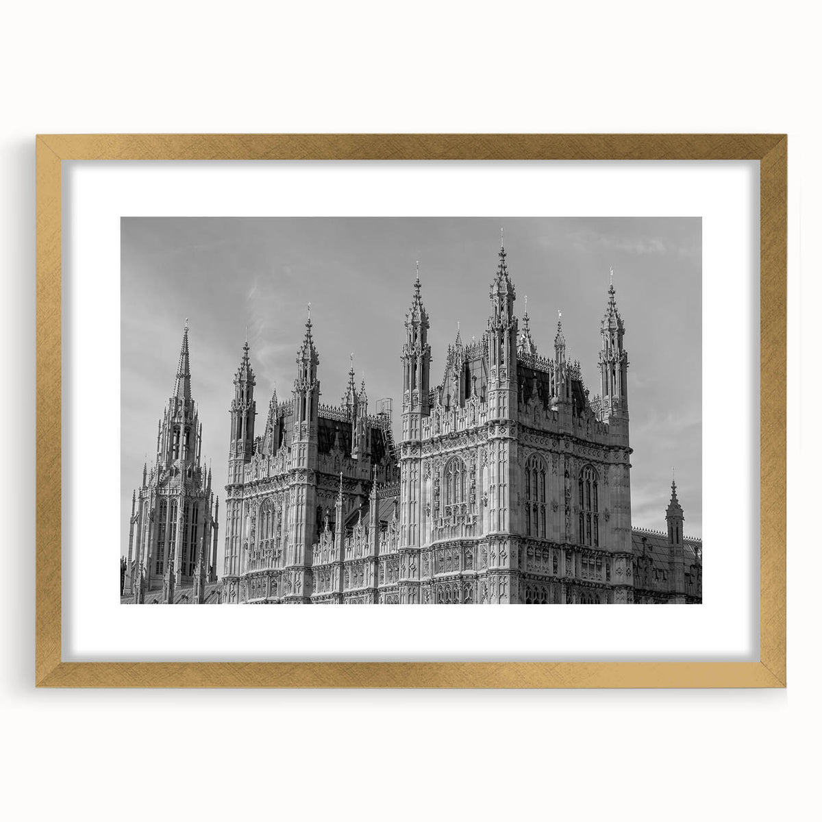 Abstract art print of London scenery in muted gold and blue tones on a framed canvas, ideal for dining room decor.