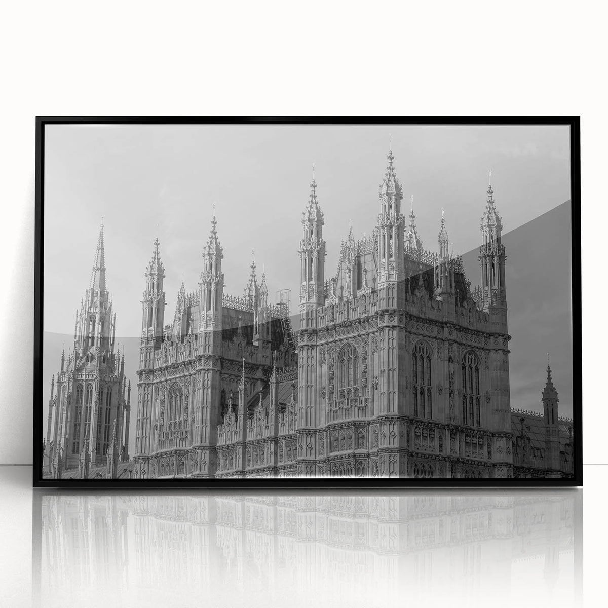 Large abstract wall art depicting the London skyline in black and white tones on a framed acrylic.