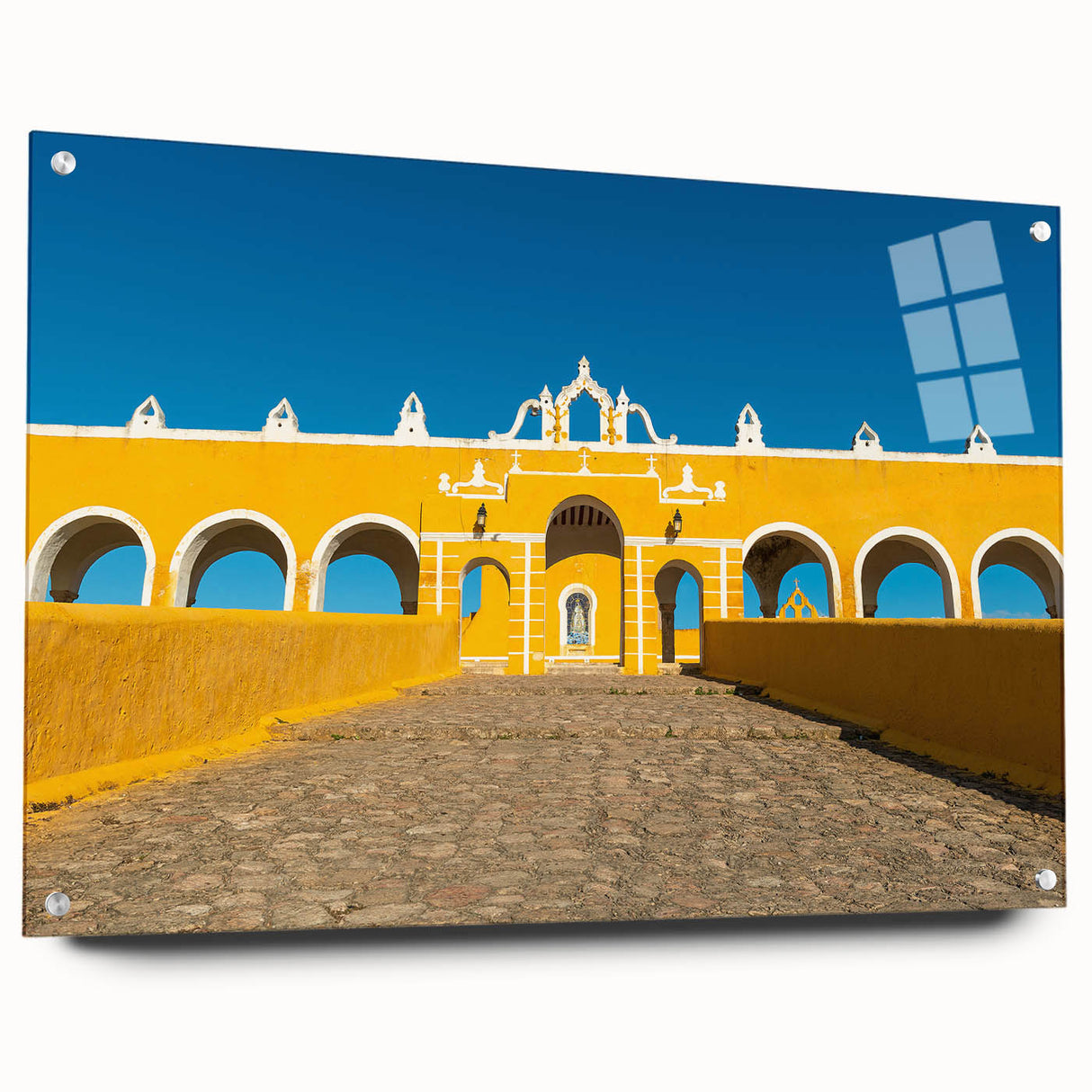 Acrylic glass print of Yucatan scenery, featuring lush green landscapes and a serene blue sky.