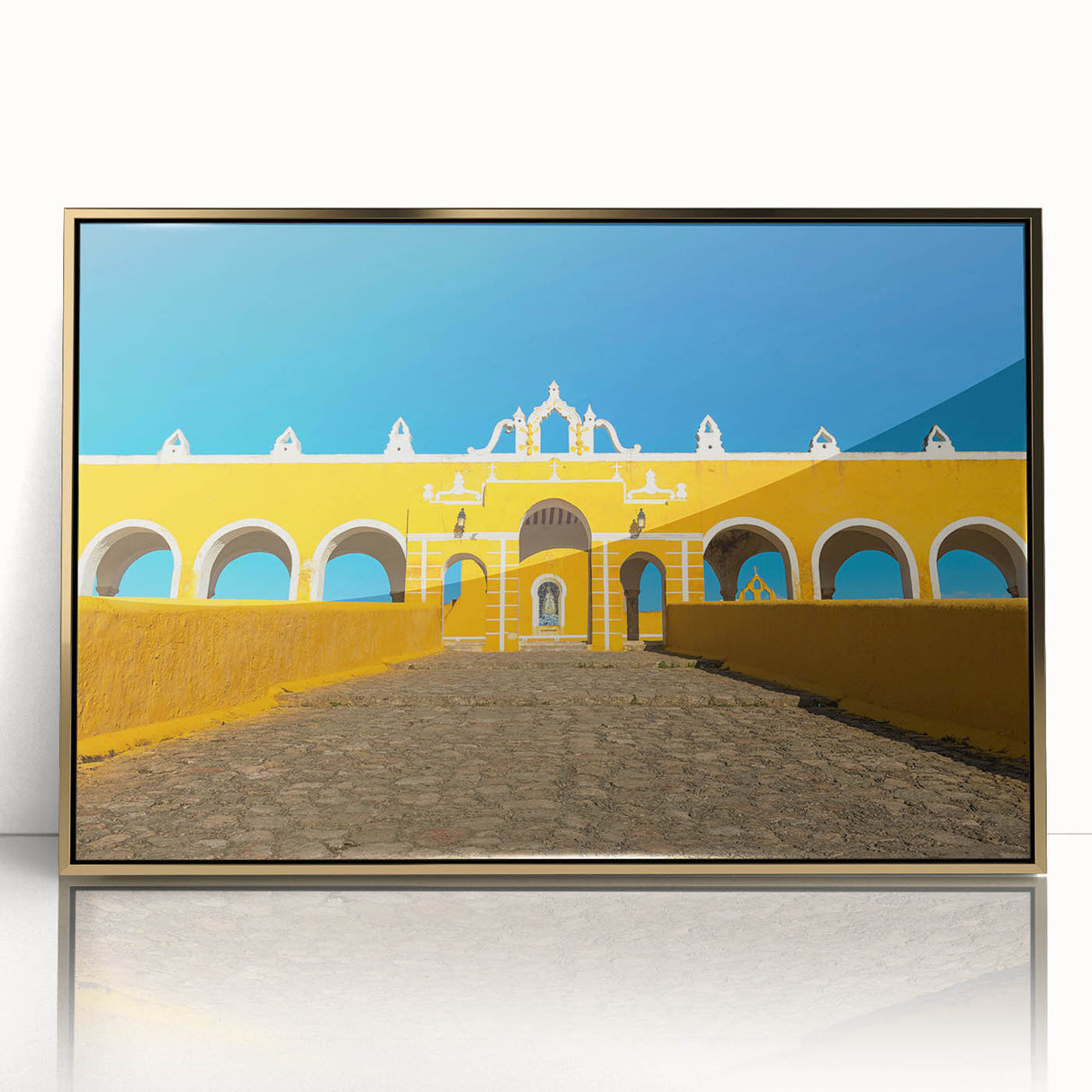Framed acrylic print of Yucatan, Mexico scenery in mid-century modernist style with gold tones.