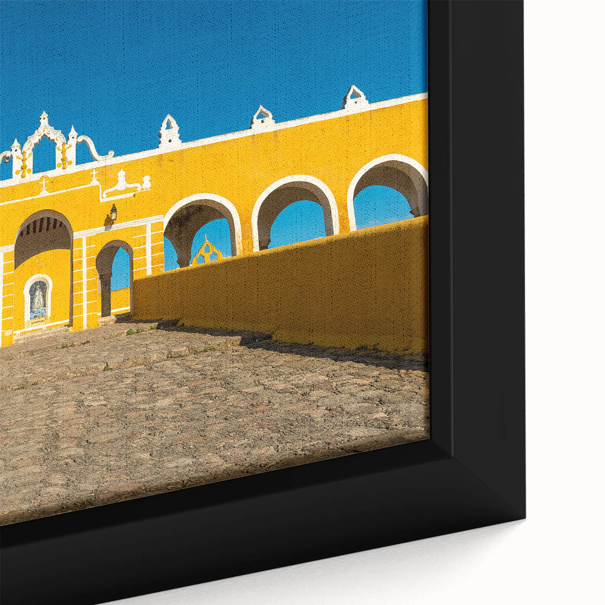 Extra large framed canvas featuring a textured depiction of Yucatan scenery in black with colorful accents.