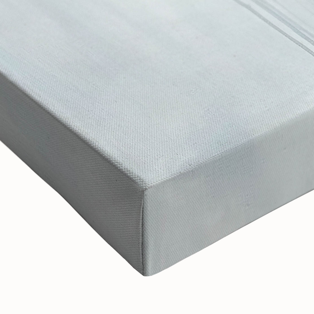 Close-up of a minimalist abstract stretched canvas artwork showcasing soft pastel colors blended harmoniously, perfect for modern home decor. Ideal for enhancing interior spaces with a calming aesthetic.