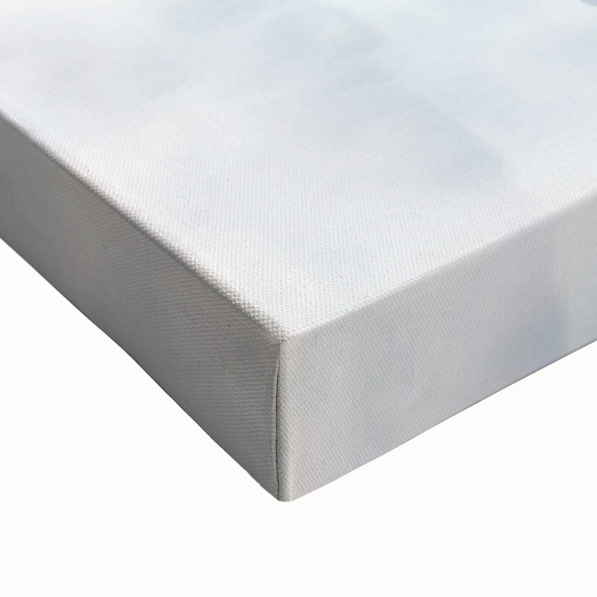 Close-up of a minimalist abstract stretched canvas artwork showcasing soft hues of blue and beige, ideal for modern home decor, emphasizing texture and artistic flair.