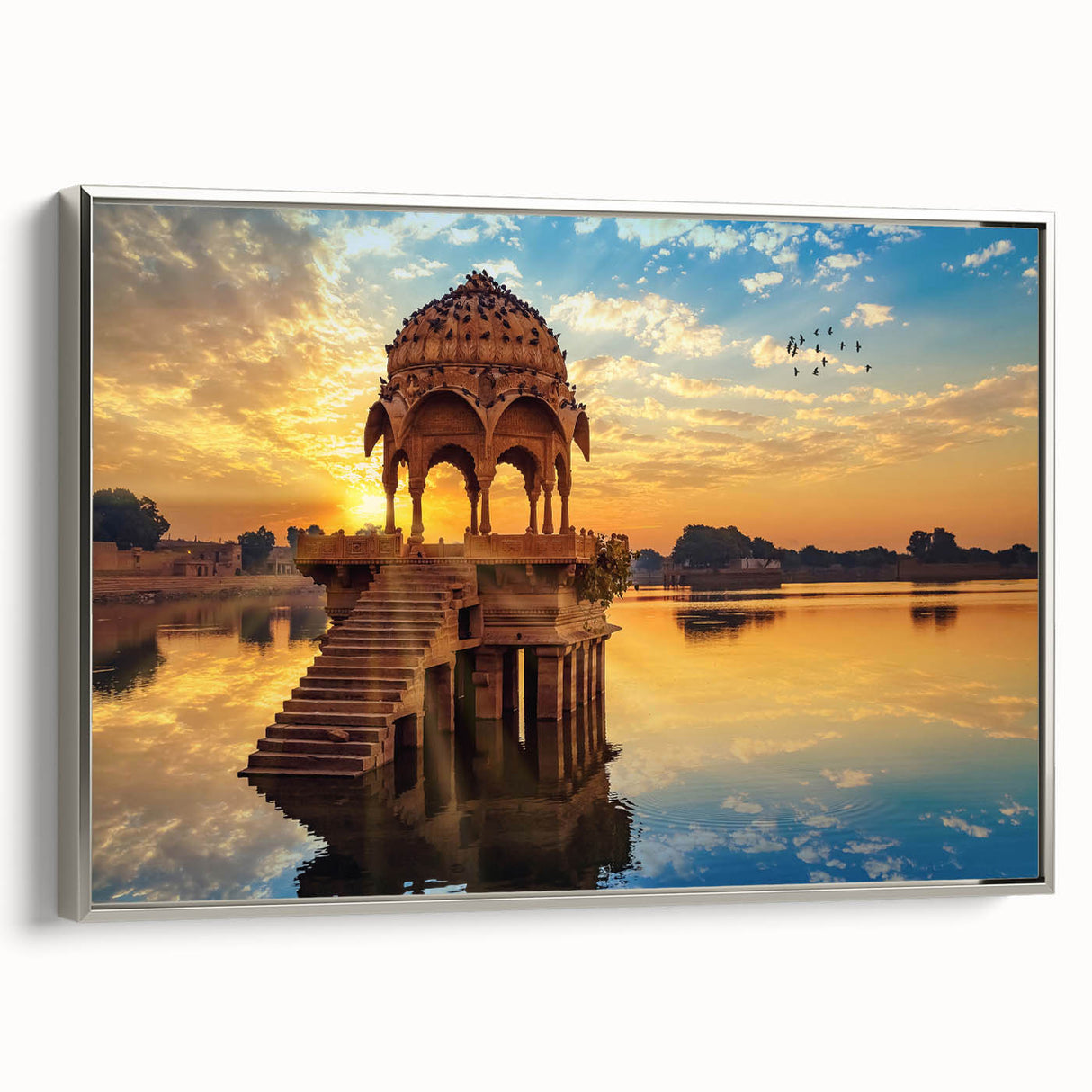Framed canvas of a vintage-style landscape painting featuring colorful Indian scenery.