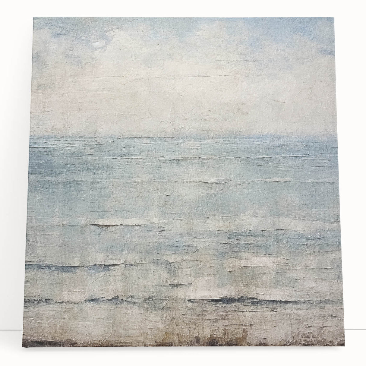 Abstract wall art featuring vibrant, multicolored strokes on a stretched canvas, leaning against a neutral wall, perfect for modern home decor and artistic spaces.