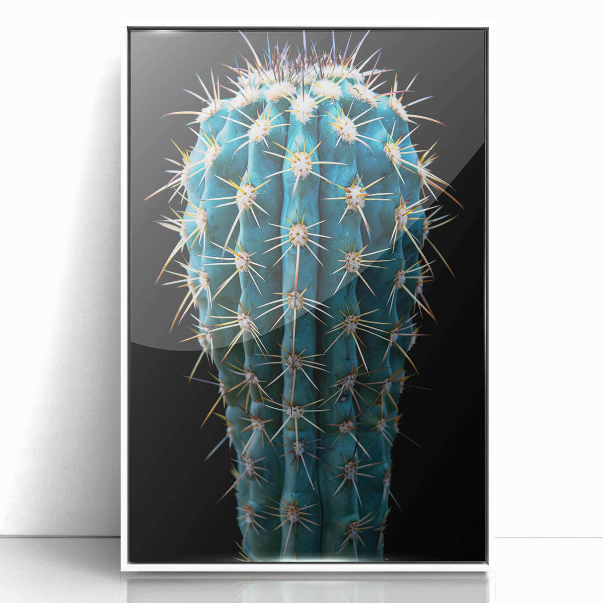 Framed botanical wall art featuring a vibrant cactus design against a white background, perfect for modern home decor, adding a touch of nature and color.