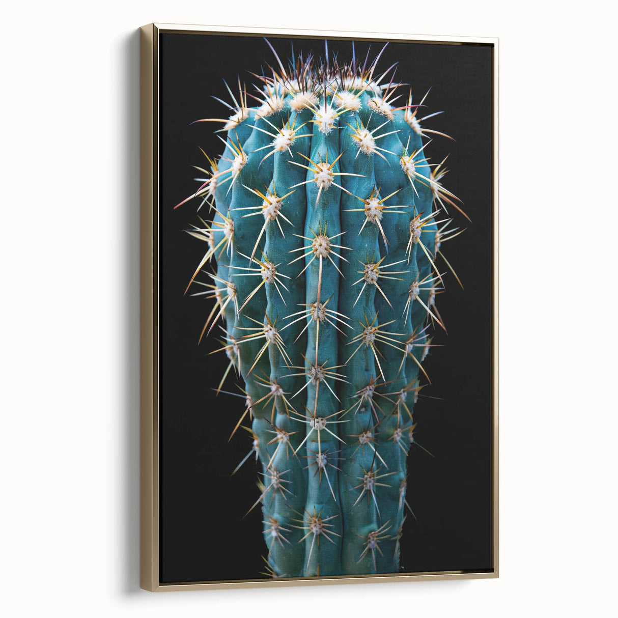Framed wall art featuring a botanical cactus design with vibrant greens and gold accents, showcasing a side view that highlights its elegant presentation. Ideal for home décor.