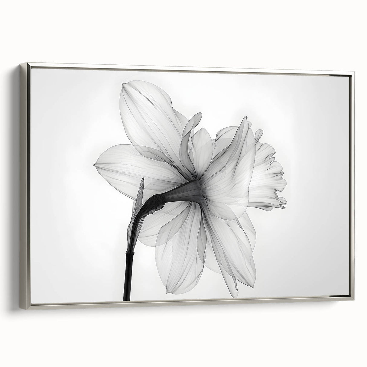 Framed wall art featuring a botanical daffodil design, showcasing vibrant yellow flowers with green leaves, set in a silver frame, perfect for home décor.