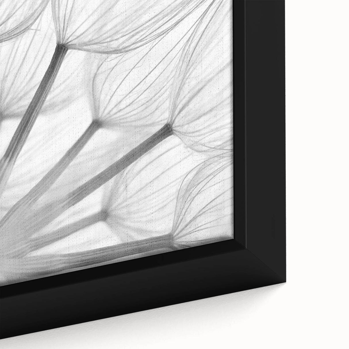 Close-up of a framed botanical wall art piece showcasing intricate dandelion designs in vibrant yellows and greens, perfect for home decor. Ideal for nature enthusiasts and modern interiors.