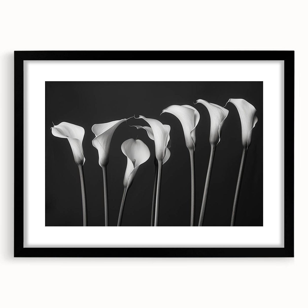 Black-framed wall art featuring a botanical lily design, showcasing intricate floral details and vibrant colors, ideal for enhancing home décor with a natural touch.