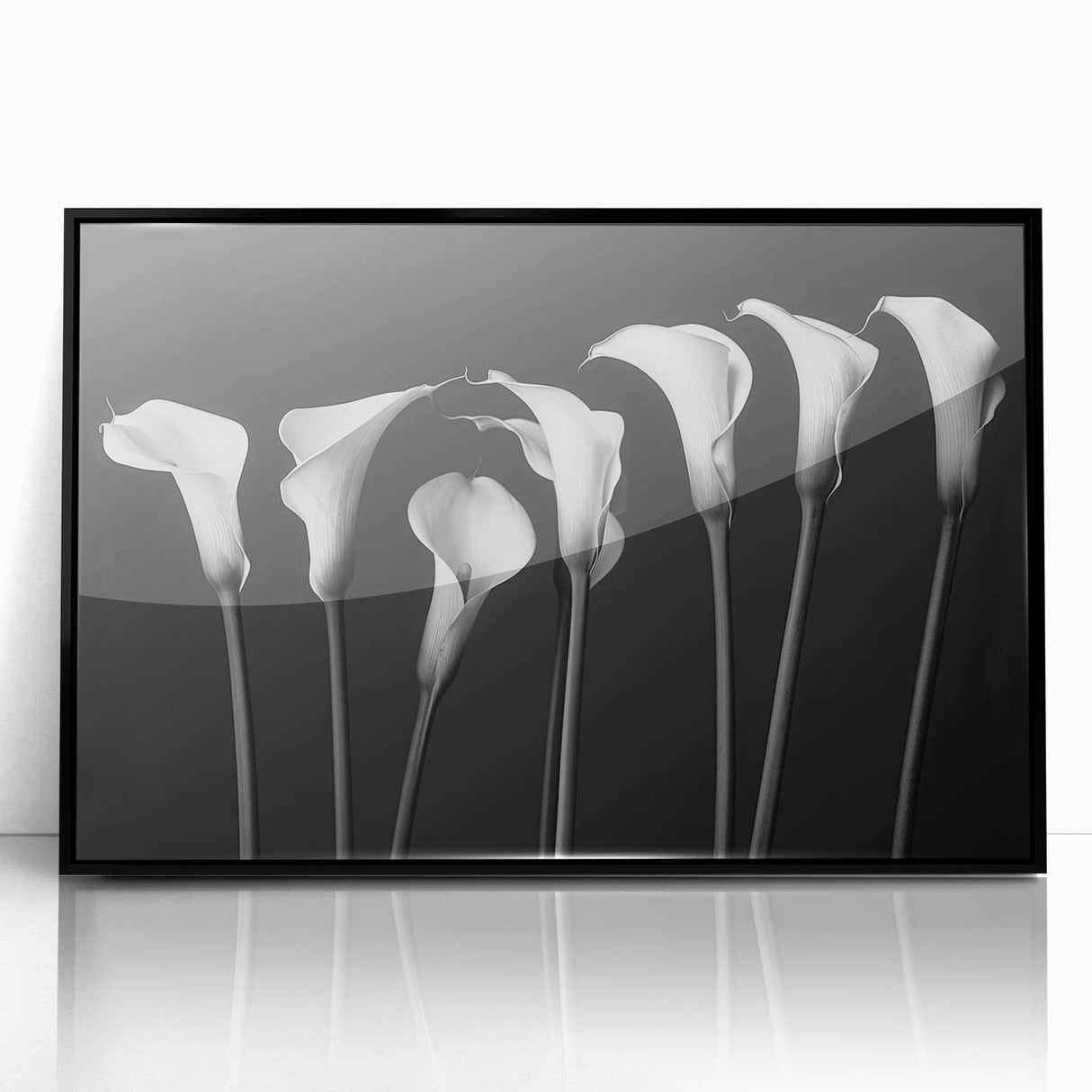 Framed botanical wall art featuring a vibrant lily design with a sleek black frame, ideal for adding elegance to home decor. Perfect for floral art enthusiasts.