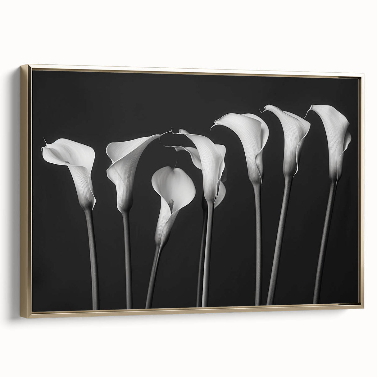 Framed botanical wall art featuring an elegant lily design on canvas with a gold frame, ideal for home decor, adding a touch of sophistication and nature.