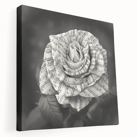 Stretched canvas wall art showcasing a botanical rose design, featuring vibrant pink and green hues, perfect for adding elegance to home decor.