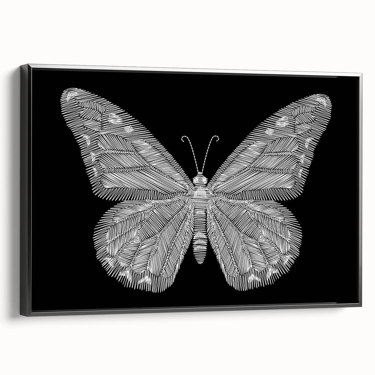Framed canvas wall art showcasing a vibrant butterfly design with intricate details, set against a black background, perfect for adding a touch of nature-inspired elegance to any space.