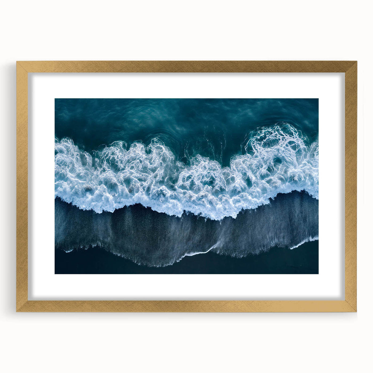 Framed wall art collection showcasing a serene beach landscape with golden matting, perfect for enhancing home decor in coastal-themed interiors.