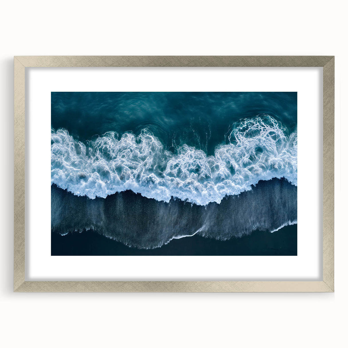 Framed wall art collection showcasing serene beach landscapes in silver matting, perfect for enhancing modern home decor with a calming coastal ambiance.