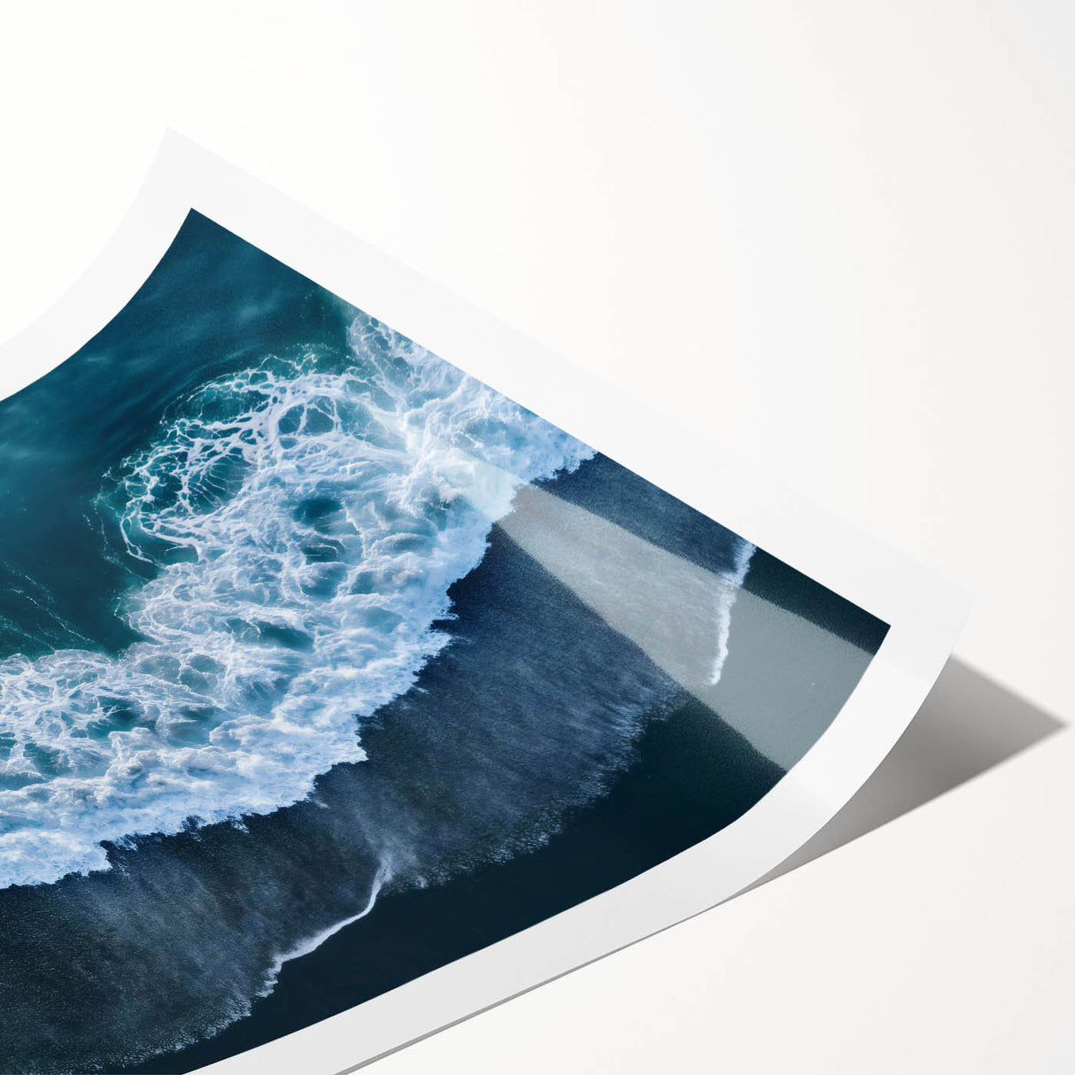 Rolled print showcasing a serene beach landscape with vibrant colors and gentle waves, ideal for home decor or office spaces, emphasizing tranquility and nature's beauty.