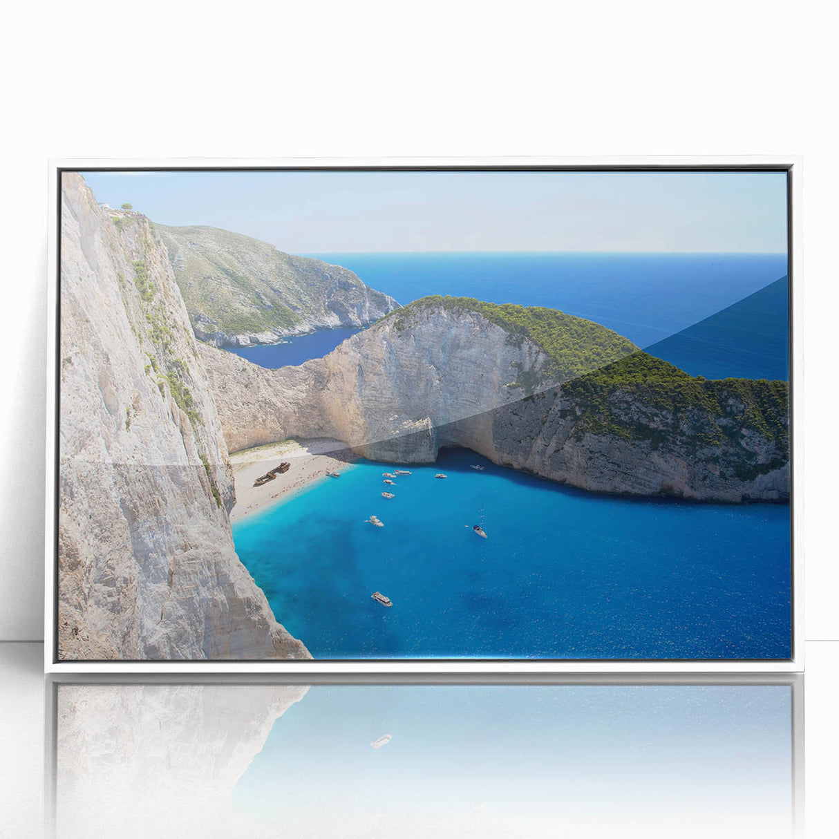 Framed wall art collection showcasing a serene beach landscape with vibrant colors, set in a sleek white frame, ideal for home decor enhancement.