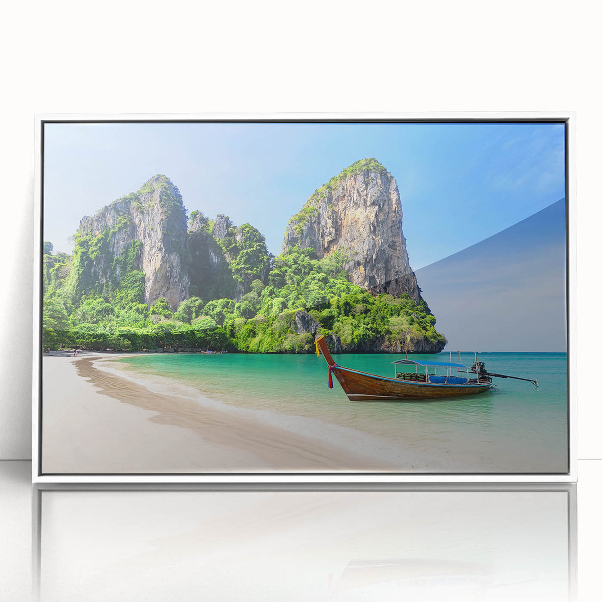 Framed wall art featuring a serene beach landscape with vibrant colors, perfect for coastal decor, showcasing calming waves and a clear sky.