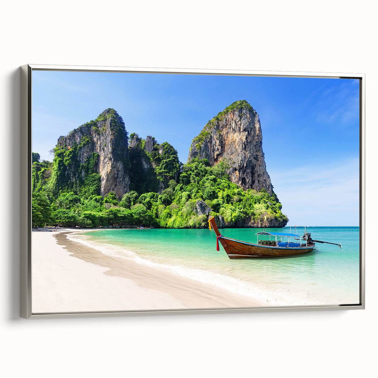 Framed canvas wall art featuring a serene beach landscape design with silver accents, showcasing vibrant blues and sandy tones, ideal for coastal decor.