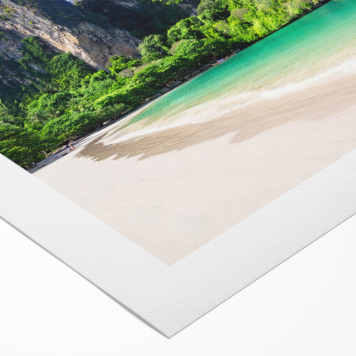 Vibrant rolled canvas wall art showcasing a serene beach landscape with soft waves and a colorful sunset, elegantly packaged in a protective cardboard tube.