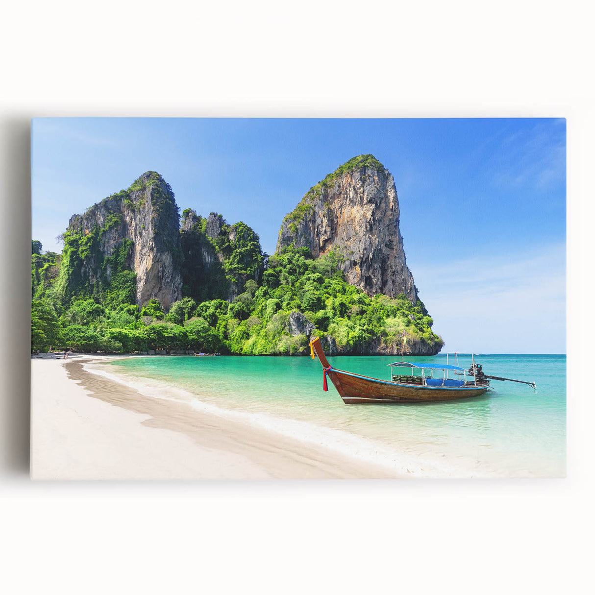 Stretched canvas wall art displaying a serene beach landscape with vibrant blue waters and golden sand, perfect for coastal home decor accents.