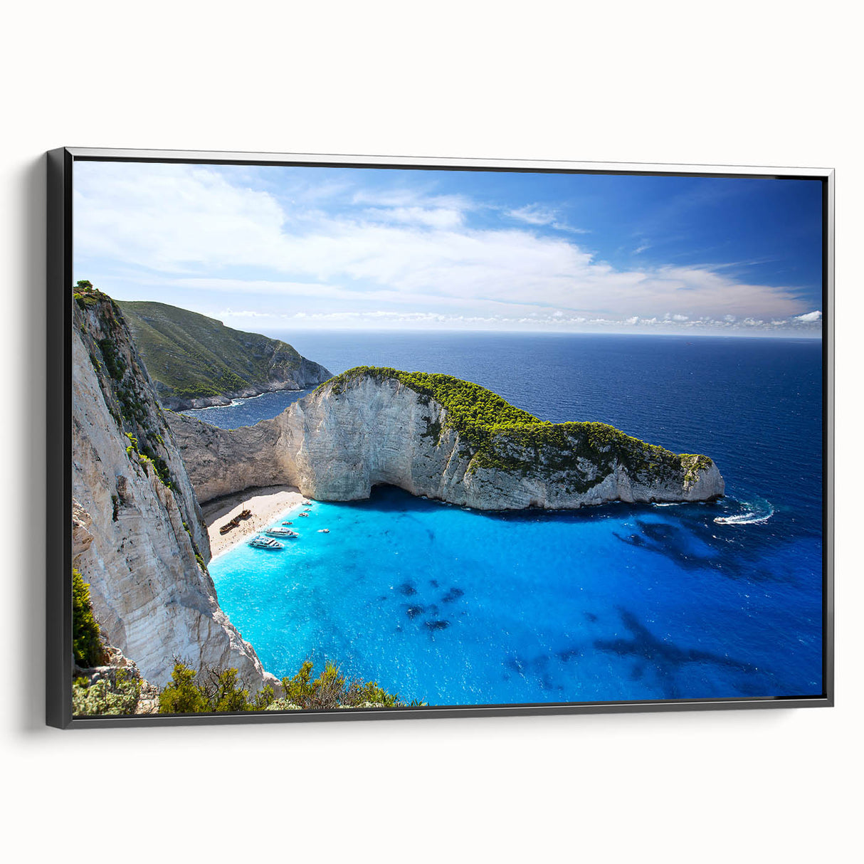 Framed canvas wall art showcasing a serene beach landscape design with vibrant colors, displayed in a sleek black frame, perfect for home decor.