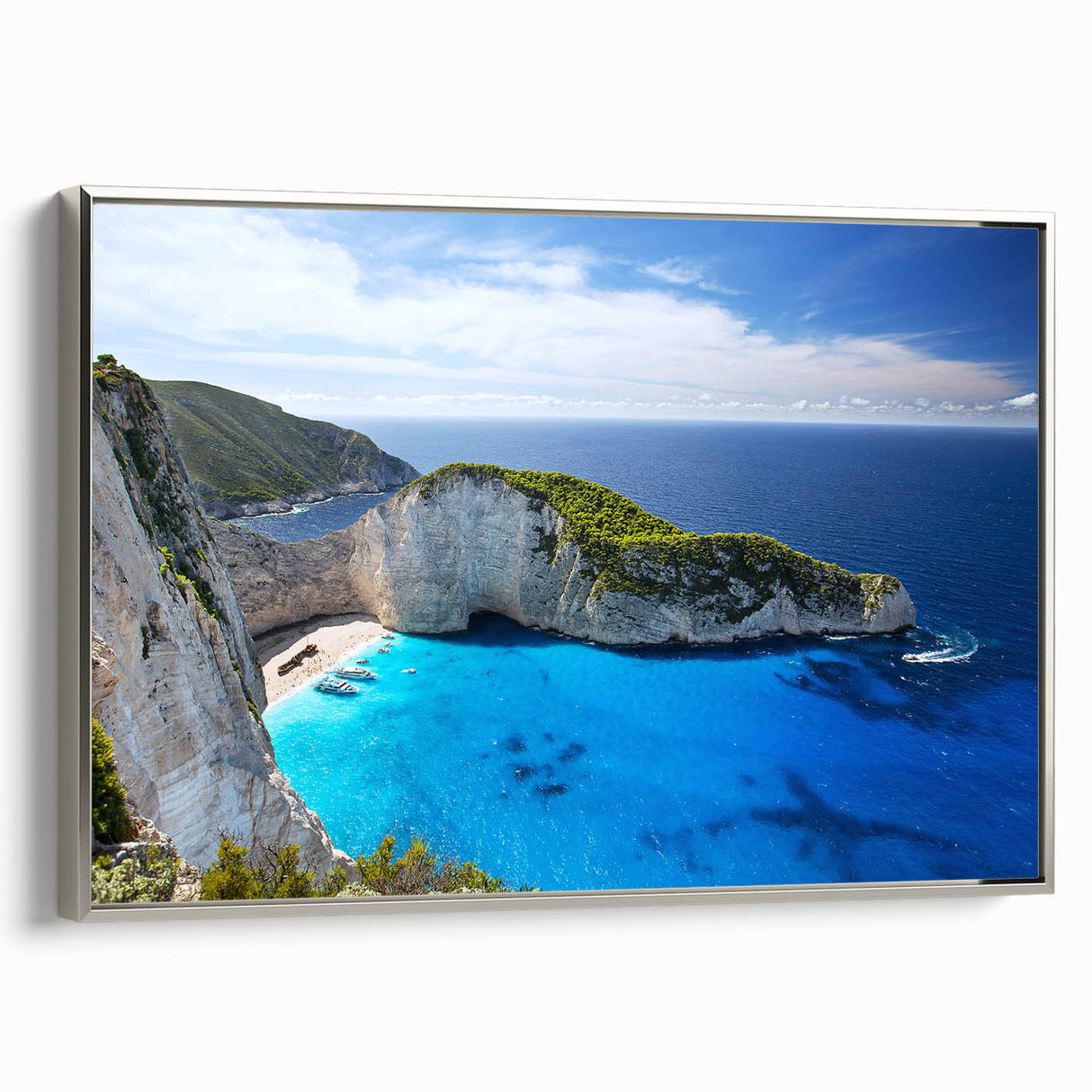 Framed canvas wall art collection showcasing a serene beach landscape with vibrant colors and intricate details, featuring a silver frame that enhances its elegance.